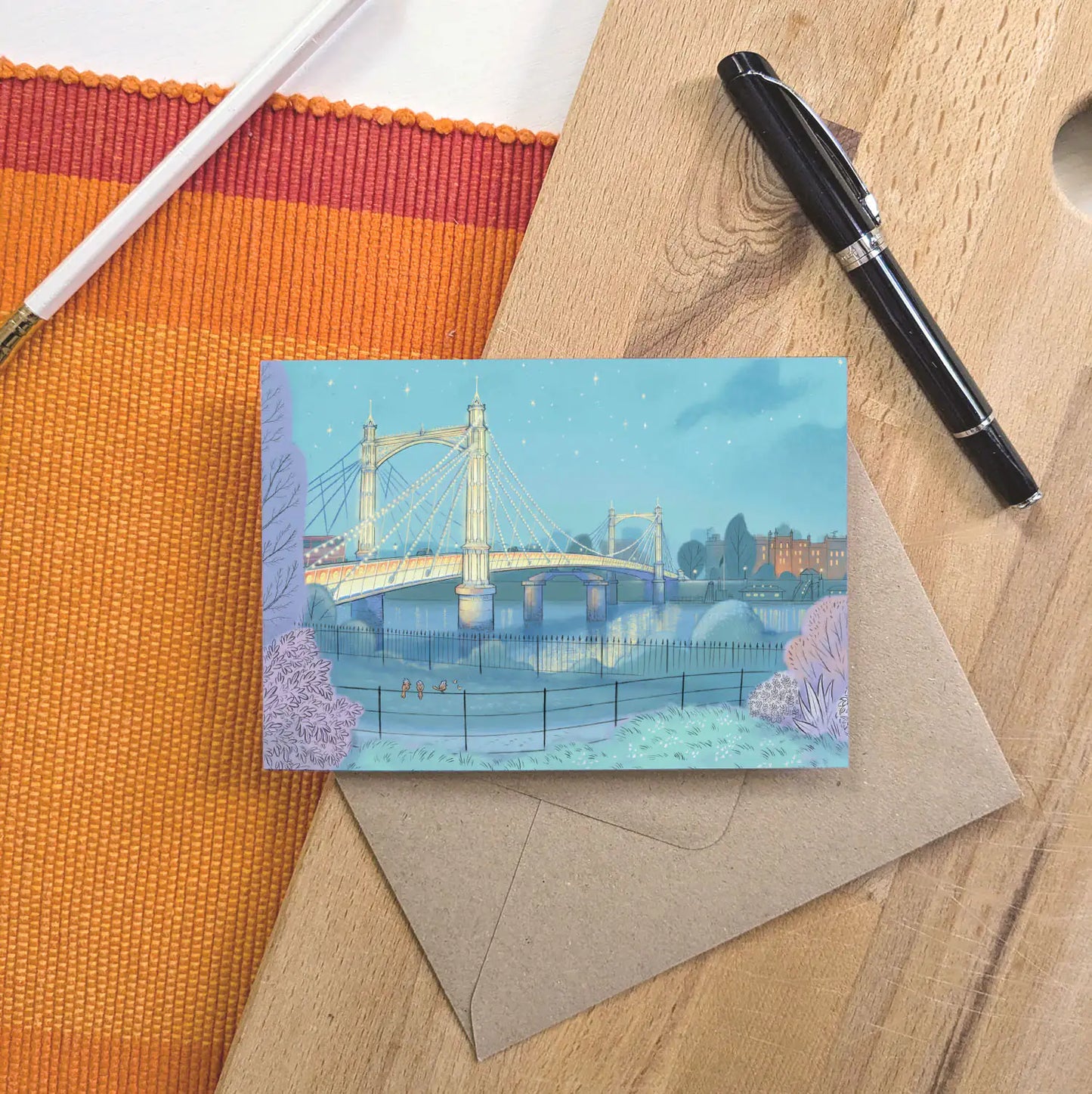 Greetings card of Albert Bridge on the Thames in London painted by Mike Green Illustration with a pen and pencil