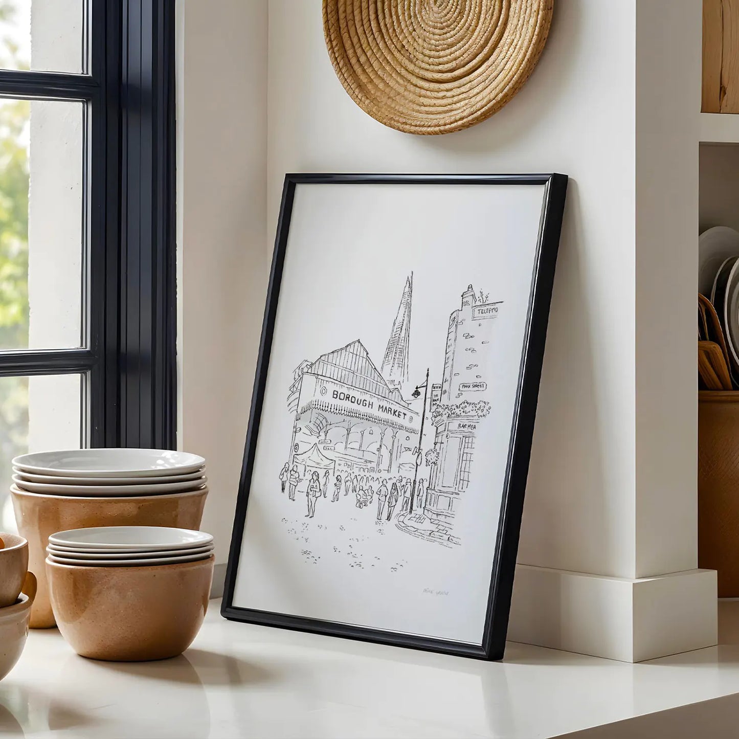 A framed print of London's Borough Market sketched by Mike Green.
