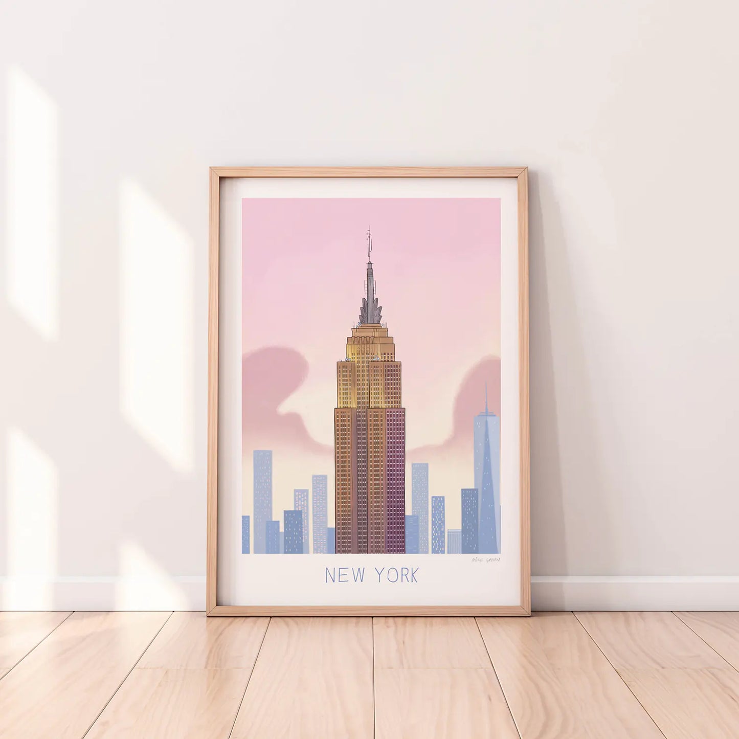 Framed print of an illustration of the Empire State Building in New York with New York written underneath