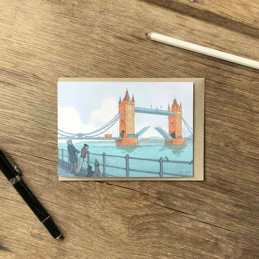 London's Tower Bridge with dog walkers beautifully illustrated on a greeting card by mike green illustration.