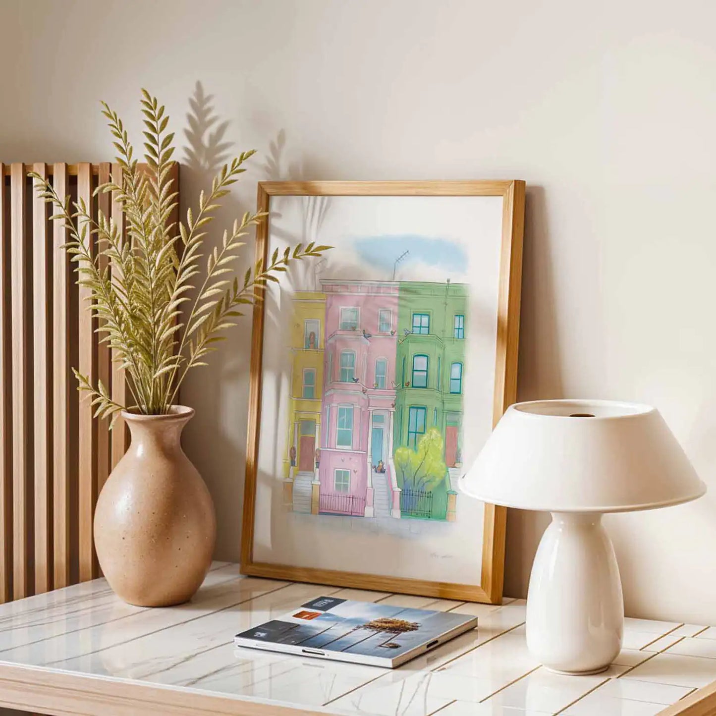 Framed art print of colourful houses in London's Notting Hill with a lazy at on the doorstop by Mike Green Illustration