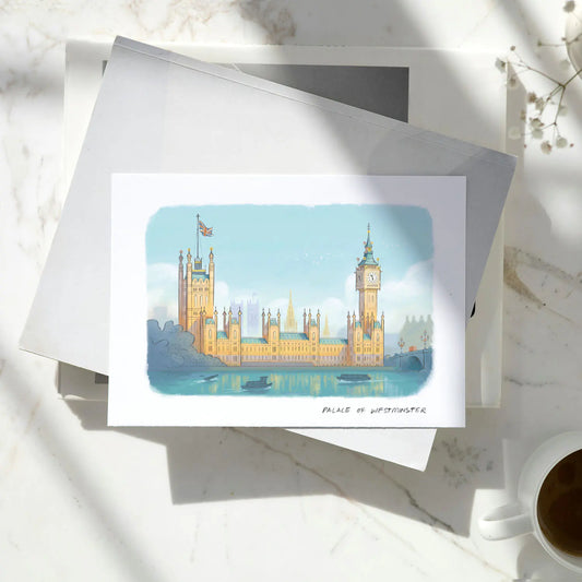 Greetings card with illustration of London's Palace of Westminster including Big Ben on top of some books