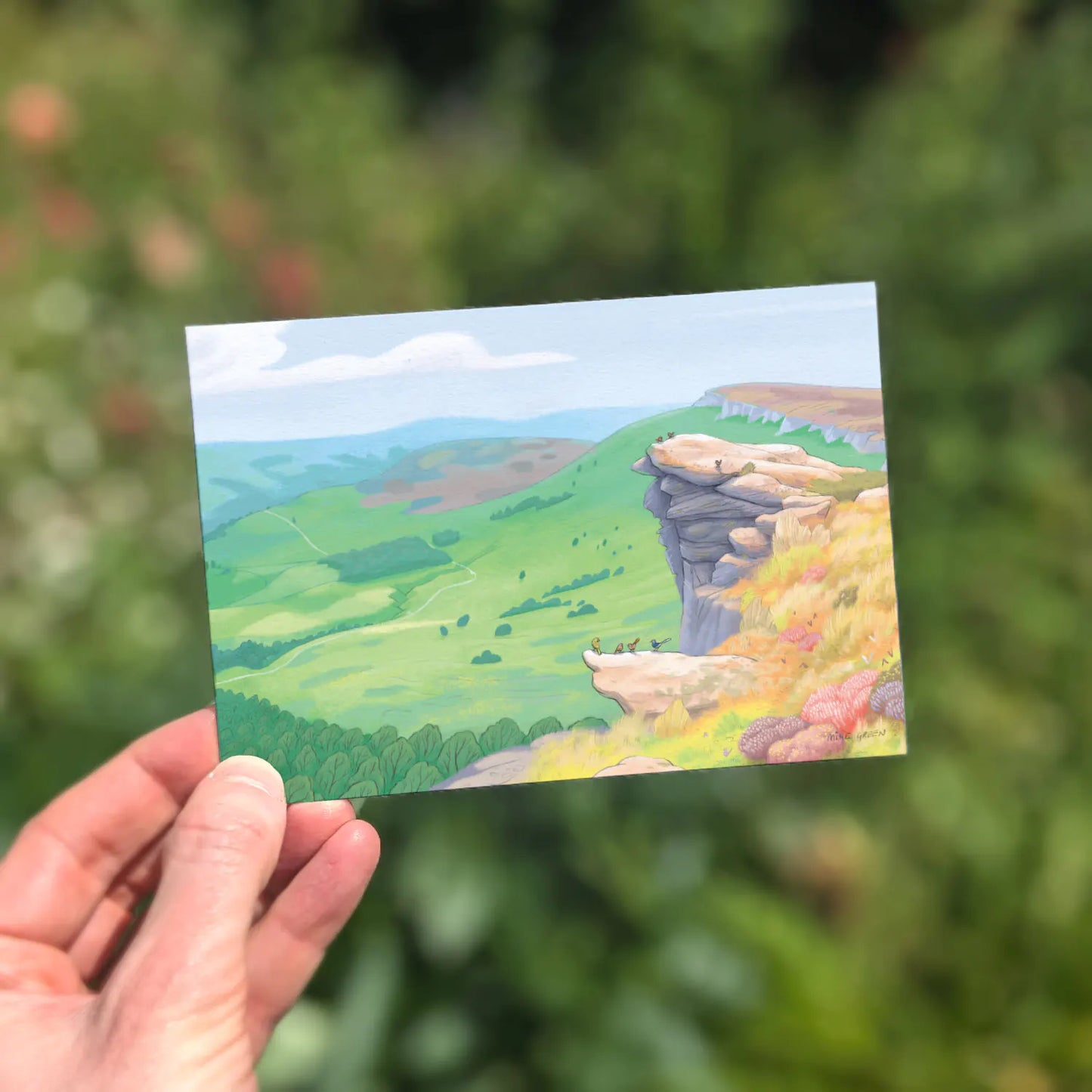 Peak District greetings card being held outside by a hand