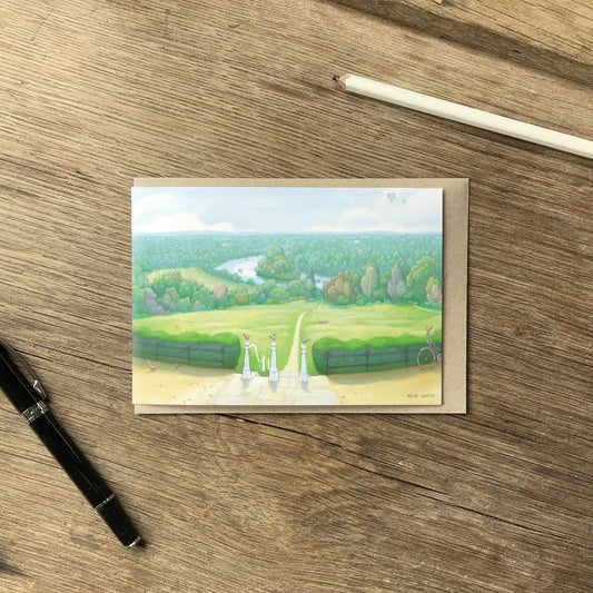 Greetings card with a painting of the view from Richmond Hill in London on a wooden desk with a pencil