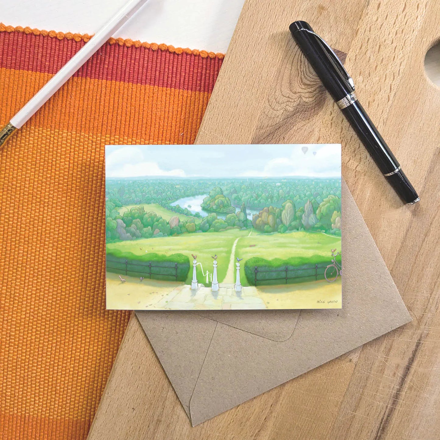 Greetings card with a painting of the view from Richmond Hill in London on a wooden board with a pen