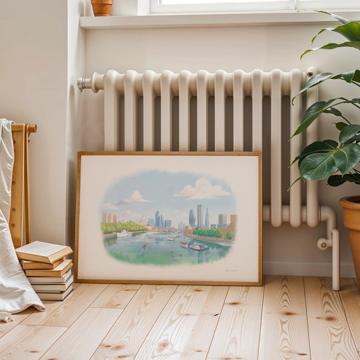 A framed print of a painting of the view from London's Waterloo Bridge towards St Paul's Cathedral by Mike Green Illustration