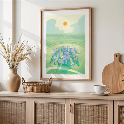 Wall art print of a painting of Stonehenge in Wiltshire England on a wooden shelf with basket and cup