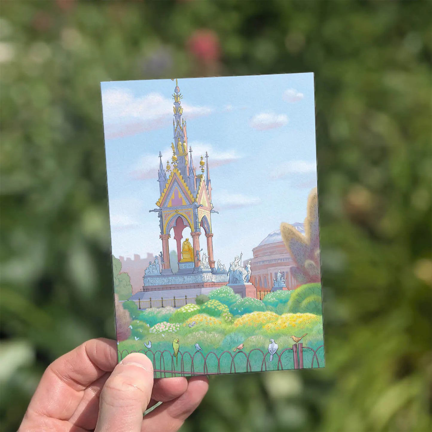 Greetings card with a painting of the Albert Memorial in Kensington Gardens, Hyde Park London held outside