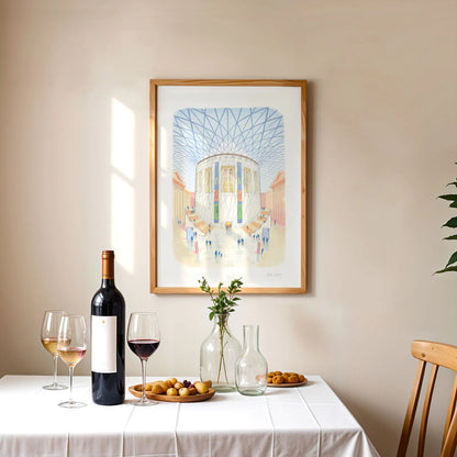 Framed wall art print of the British Museum great court in London with wine and fruit on a table