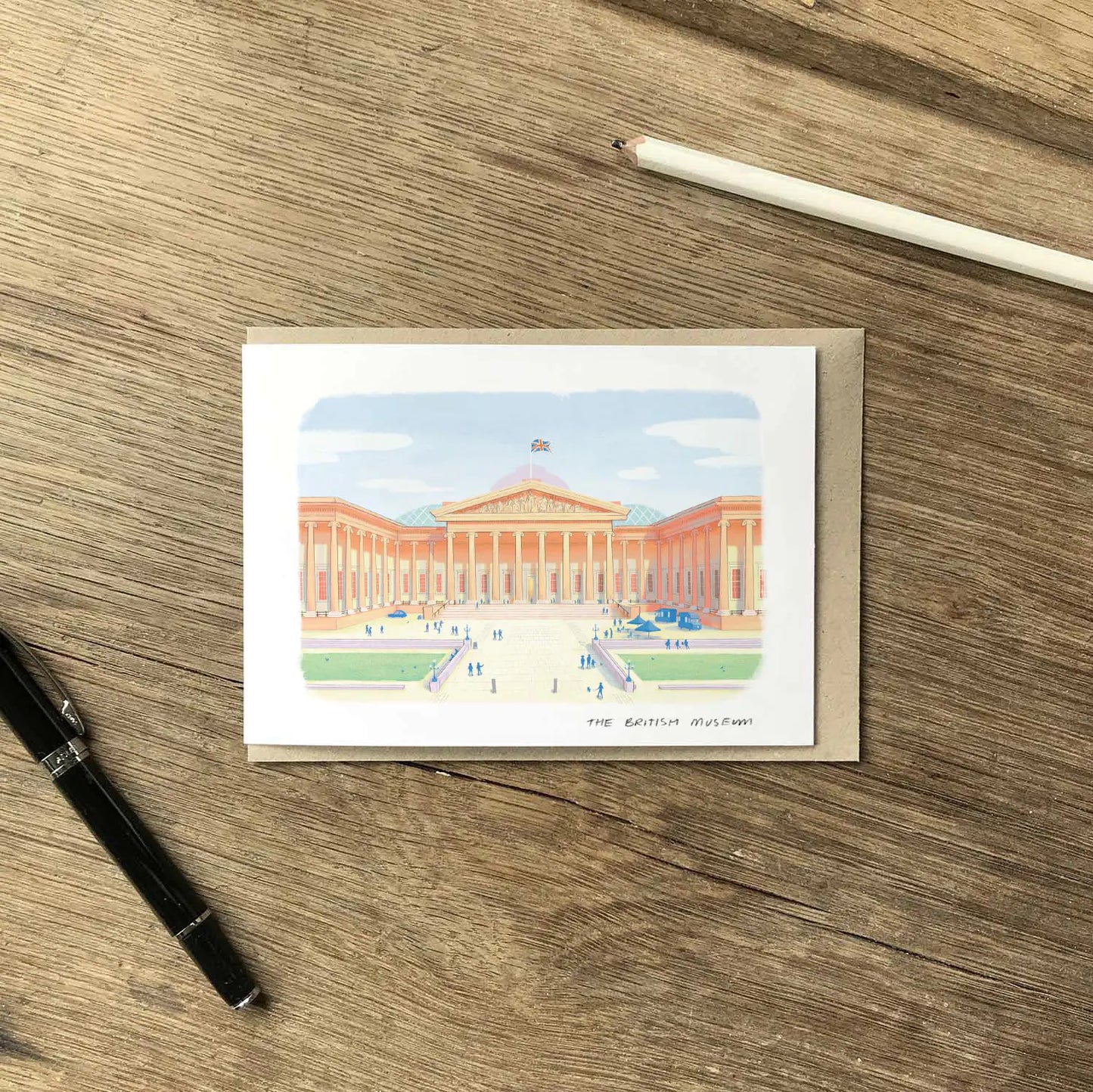 Greetings card of The British Museum in London with an envelope, pen and pencil
