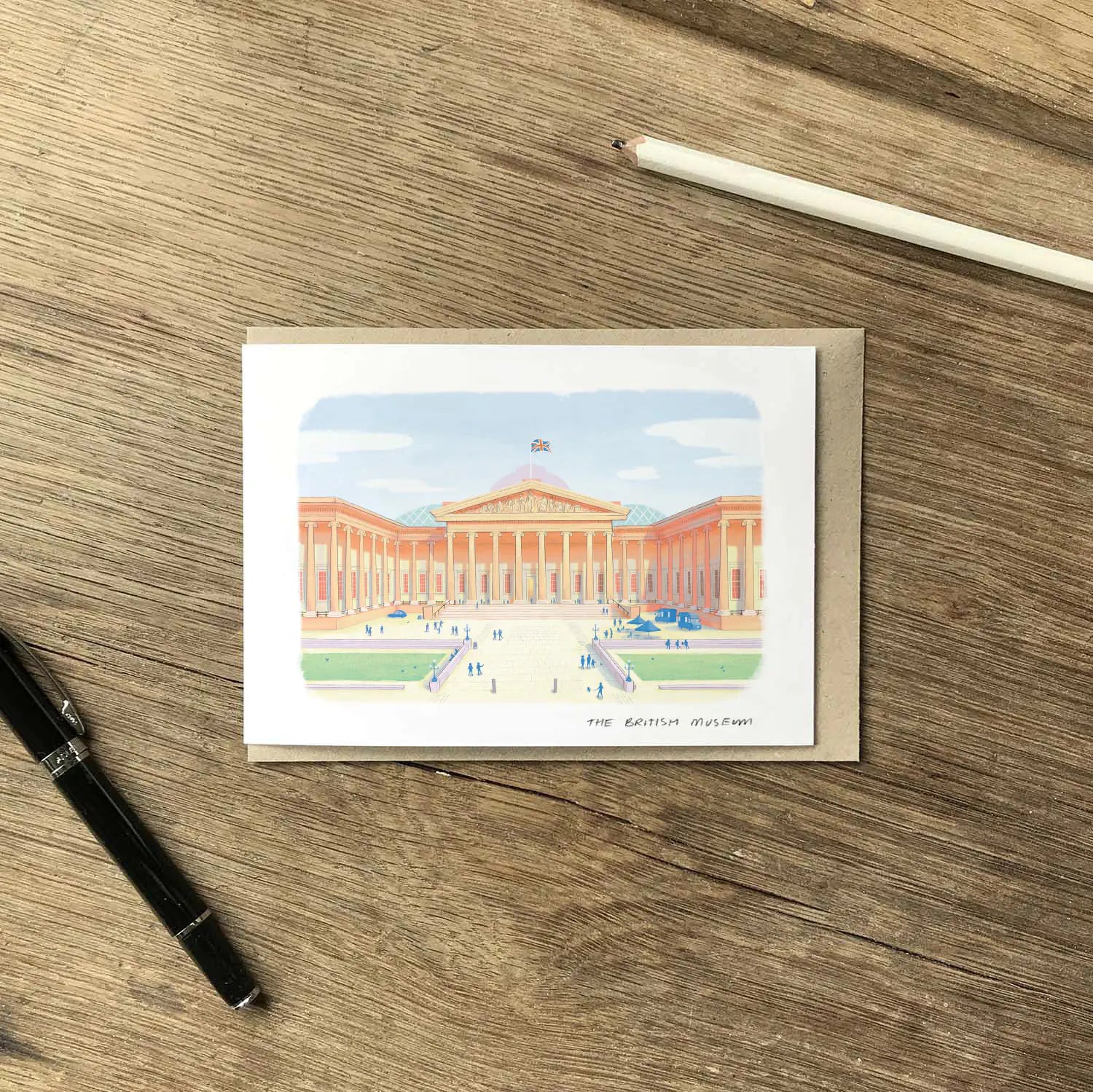 Greetings card of The British Museum in London with an envelope, pen and pencil