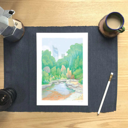 Signed wall art print of a painting of Elephant Park in London's Elephant and Castle with pencil and coffee cup