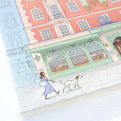 Photo of a wall art print of the Fortnum and Mason Store in London showing a lady and her dog