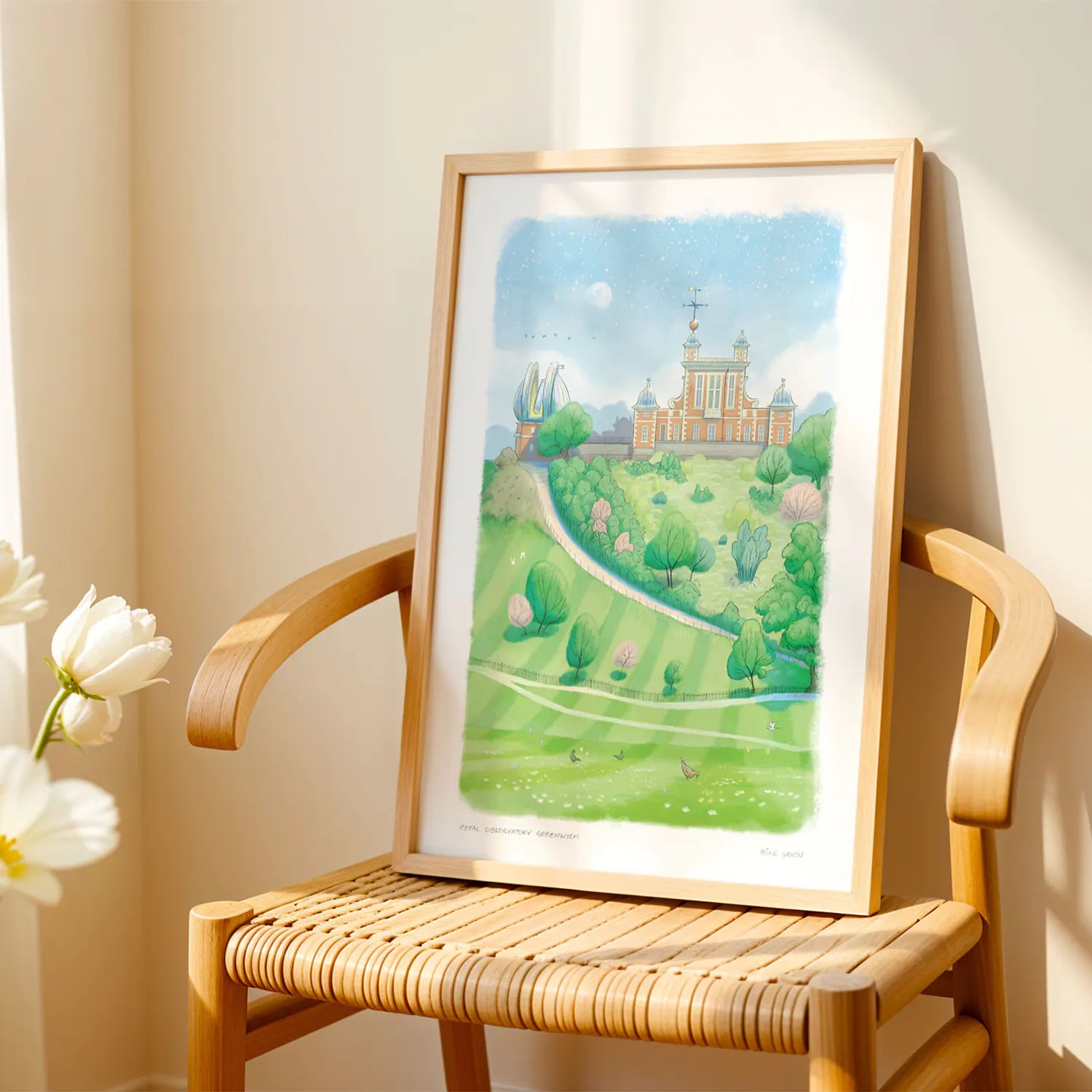 Art print of a painting of the Royal Observatory Greenwich in London by Mike Green Illustration laying on a chair