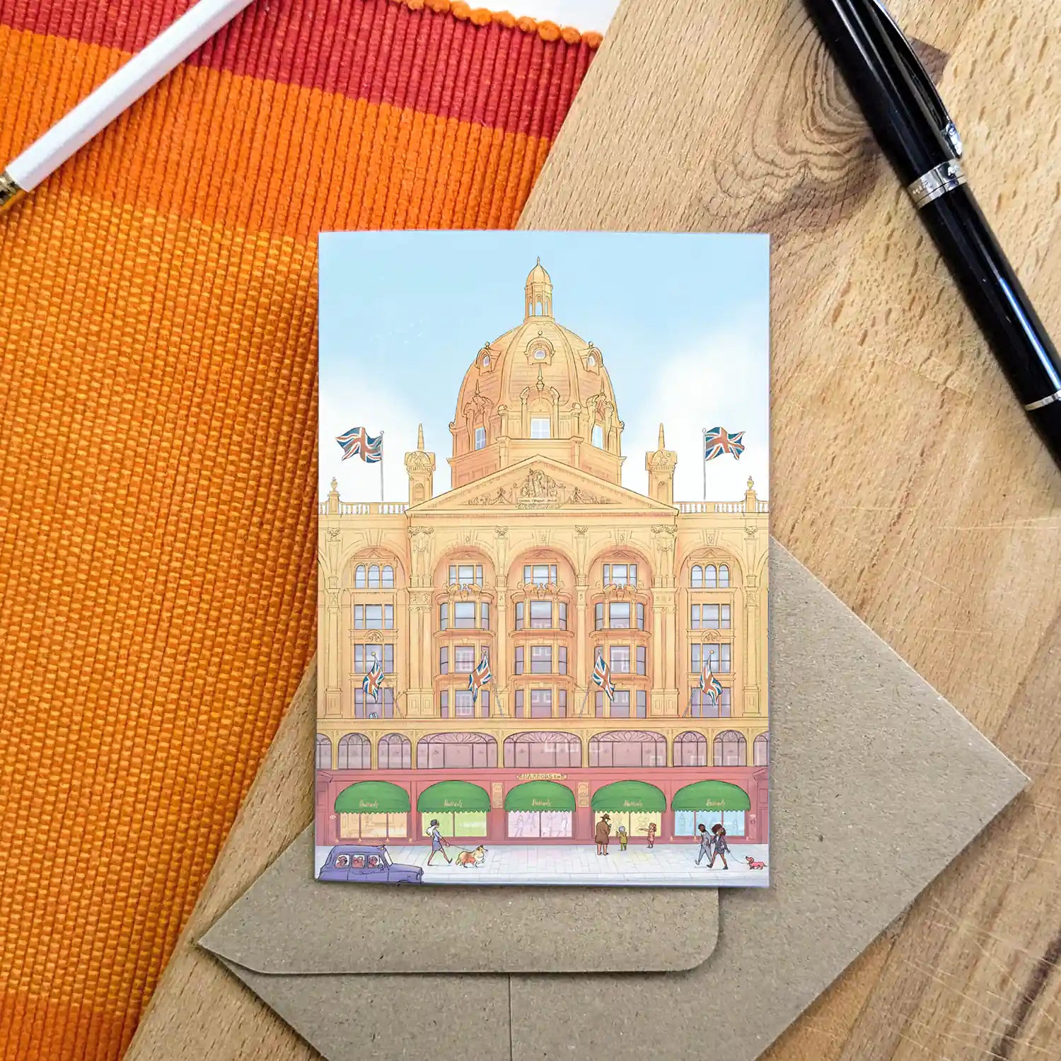 London's Harrods Store beautifully illustrated on a greeting card by mike green illustration.