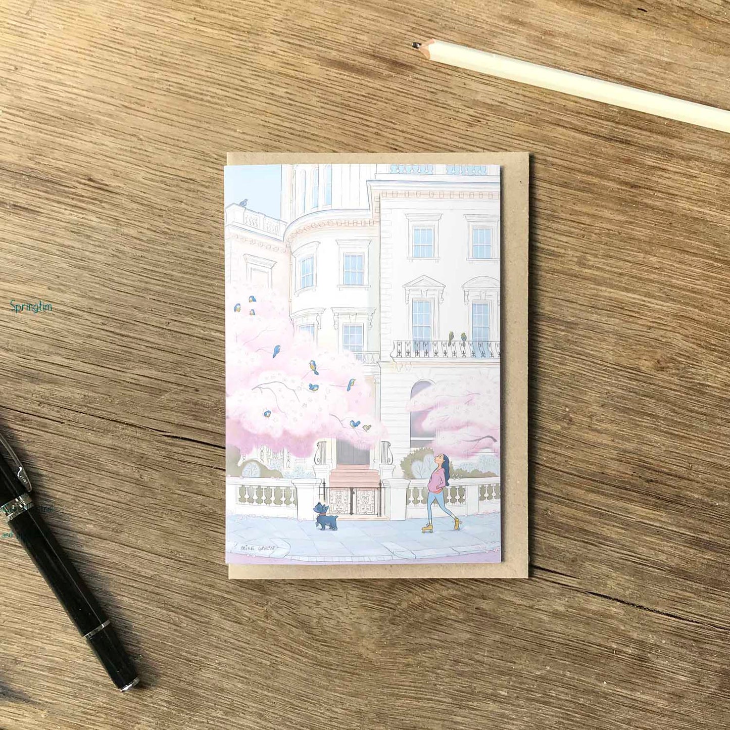 A lady and her dog skates through londons Kensington in the spring in this beautifully illustrated greeting card by mike green illustration.