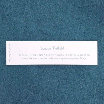 Back of a bookmark of London's skyline at night with St Paul's Cathedral and Big Ben
