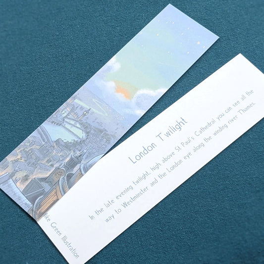 Front and back of a bookmark of London's skyline at night with St Paul's Cathedral and Big Ben