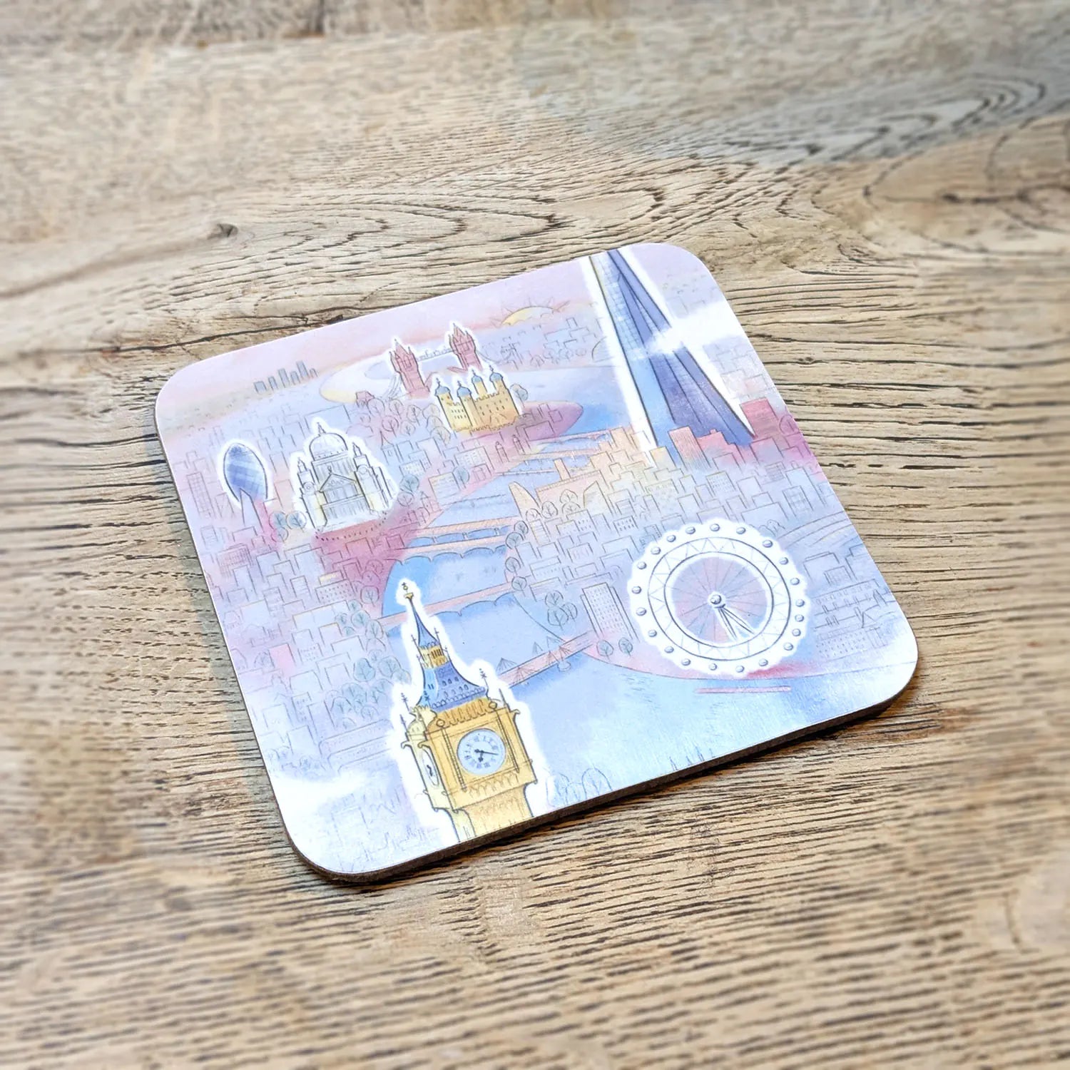 Coaster with a painting of Big Ben, the London Eye, St Paul's and the Shard in pastel colours