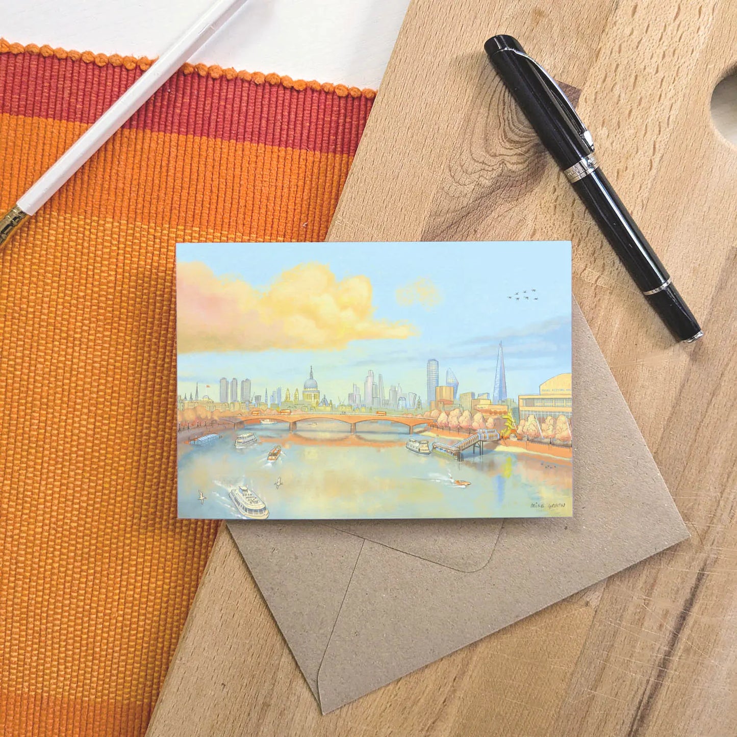Greetings card with a painting of St Pauls Cathedral, waterloo bridge and the Thames in London in the evening sunshine with an envelope