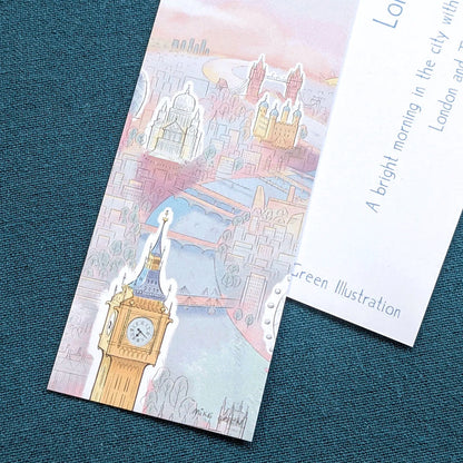 Close up of a London bookmark with landmarks in the sunshine including Big Ben, St Paul's Cathedral and Tower Bridge