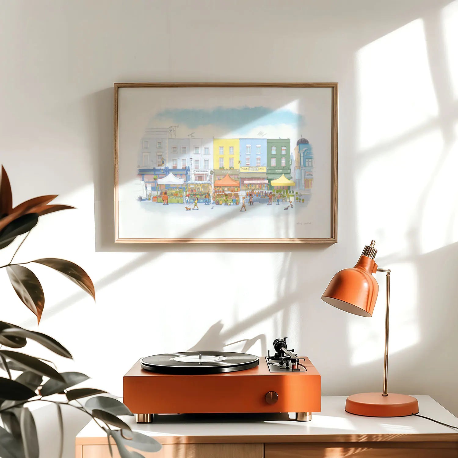 Framed wall art print of an illustration of Portobello Road market in London's Notting Hill with a record player and lamp
