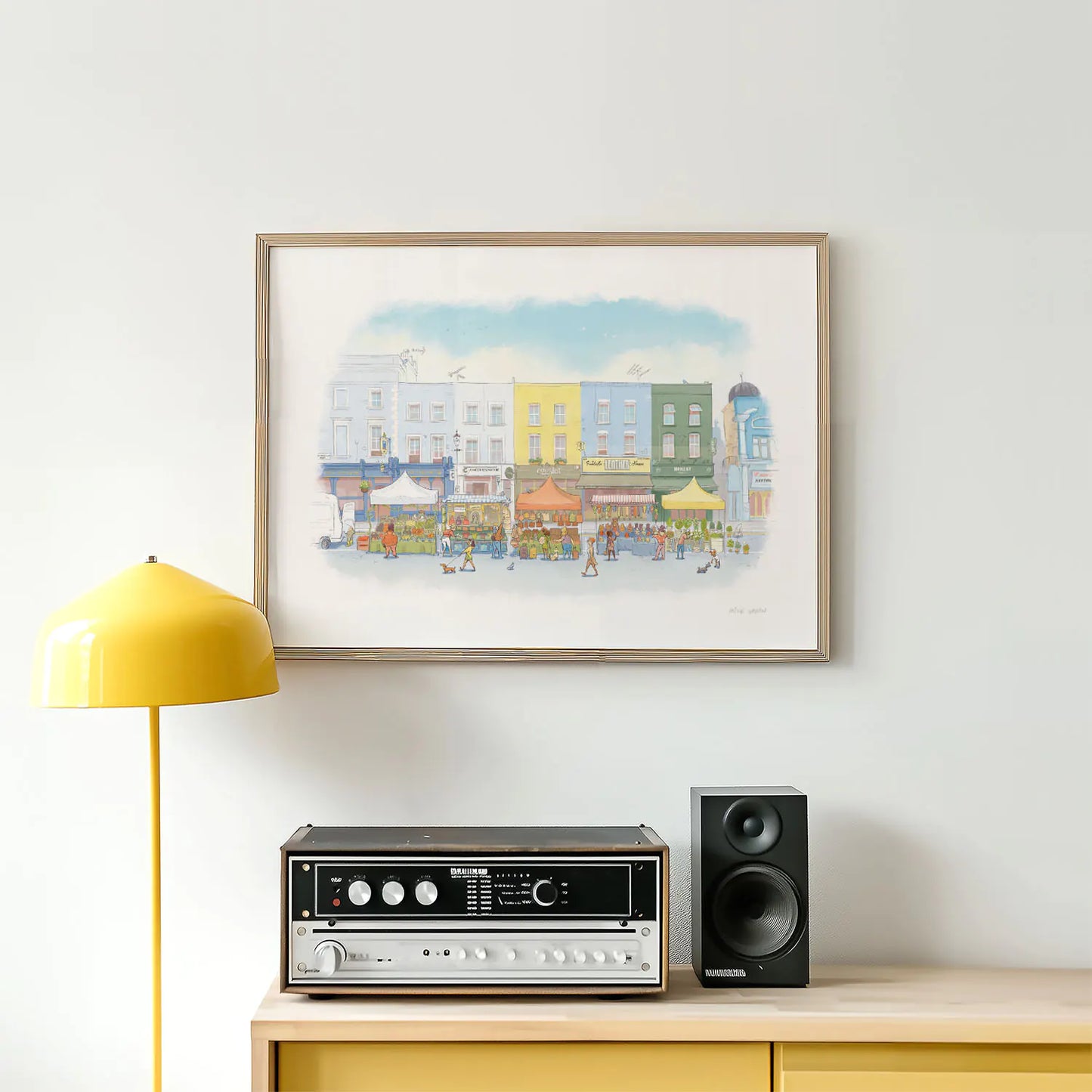Framed wall art print of an illustration of Portobello Road market in London's Notting Hill with an amplifier, lamp and speaker