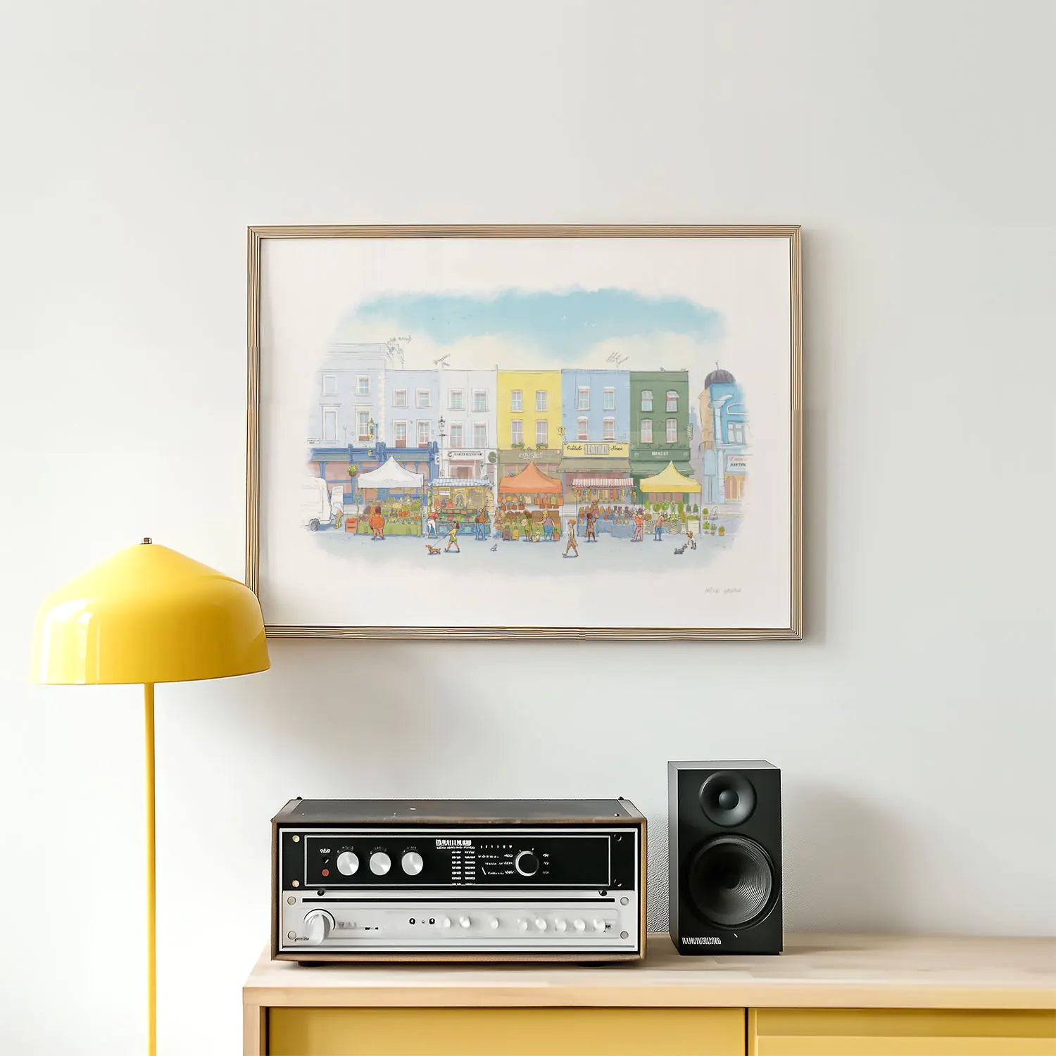 Framed wall art print of an illustration of Portobello Road market in London's Notting Hill with an amplifier, lamp and speaker