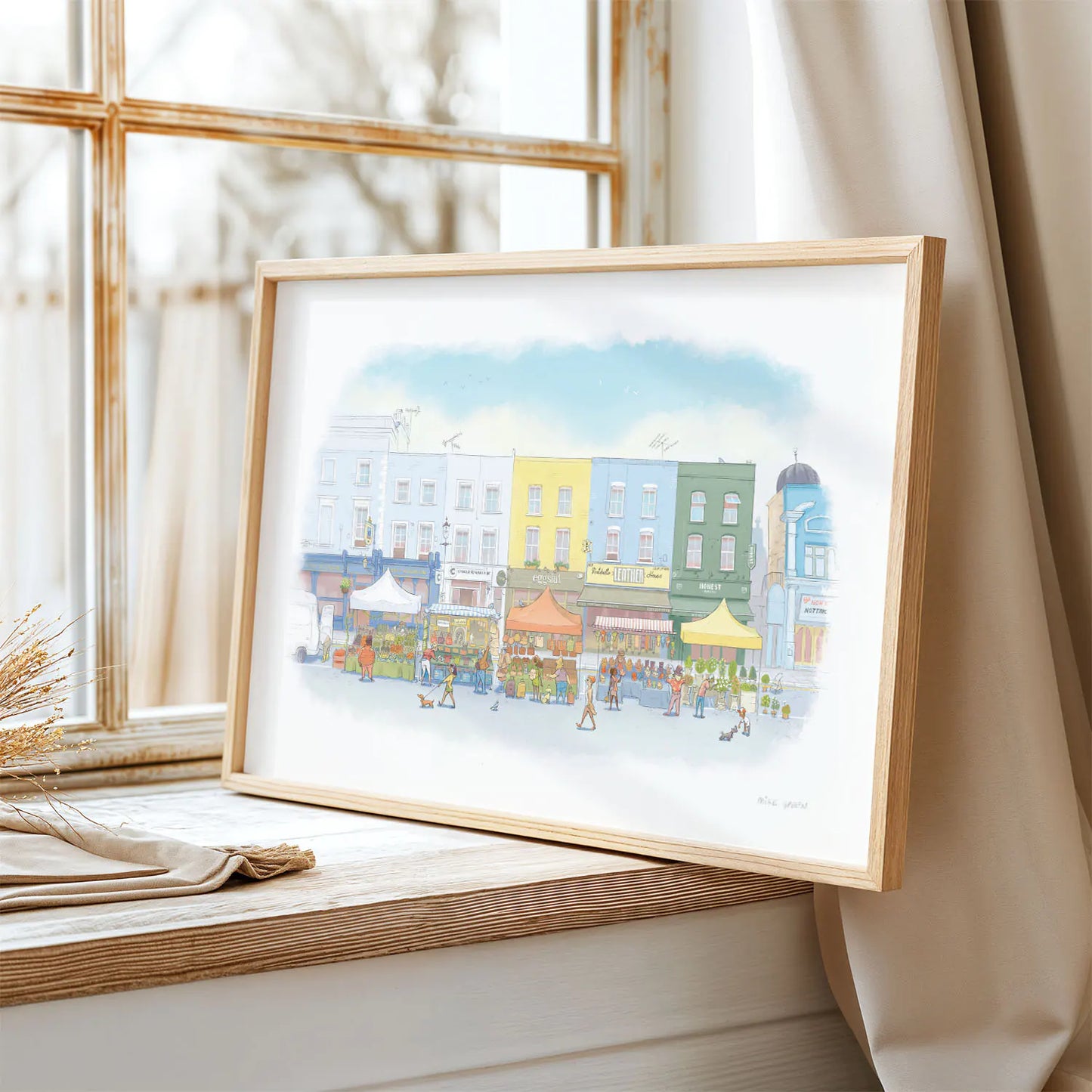 Framed wall art print of an illustration of Portobello Road market in London's Notting Hill on a window sill