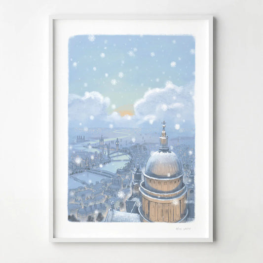 Framed wall art print of St Paul's Cathedral and London skyline in the evening with falling snow.