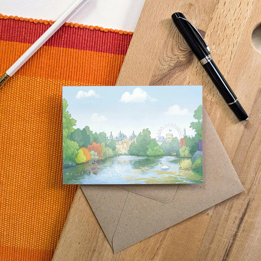Greeting card with illustration of St James's Park in London including the park wildlife with an envelope and pen