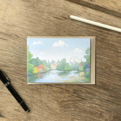 Greeting card with illustration of St James's Park in London including the park wildlife with an envelope and pen