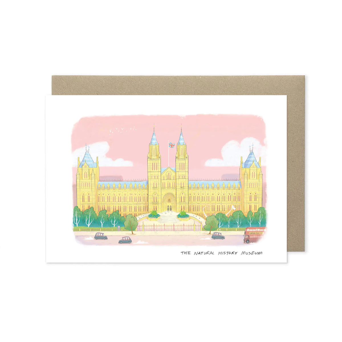 A greetings card featuring a pastel colour illustration of The Natural History Museum in London, layered over a brown kraft envelope on a white background.