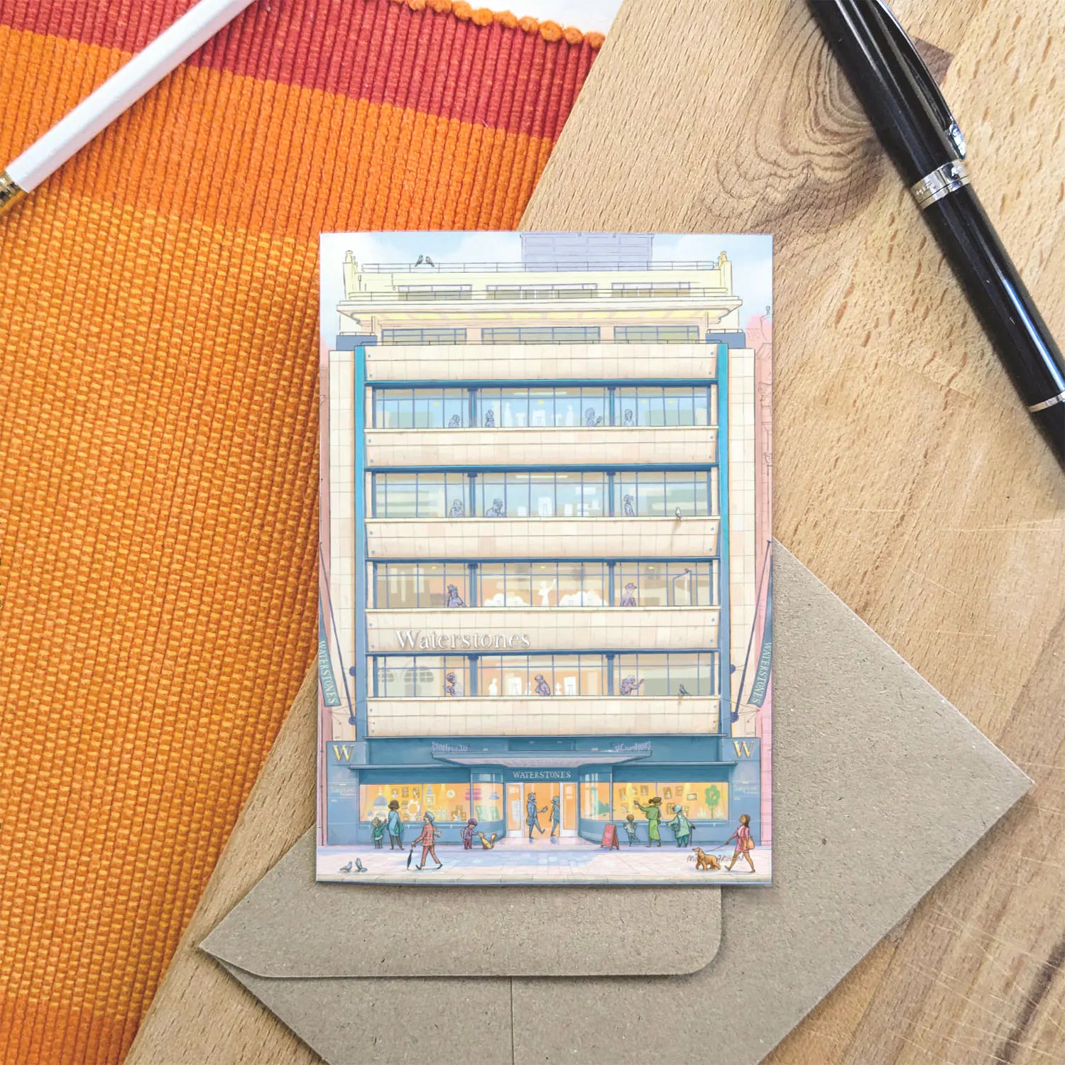 Greetings card of Waterstones Piccadilly bookstore in London with an envelope and pen