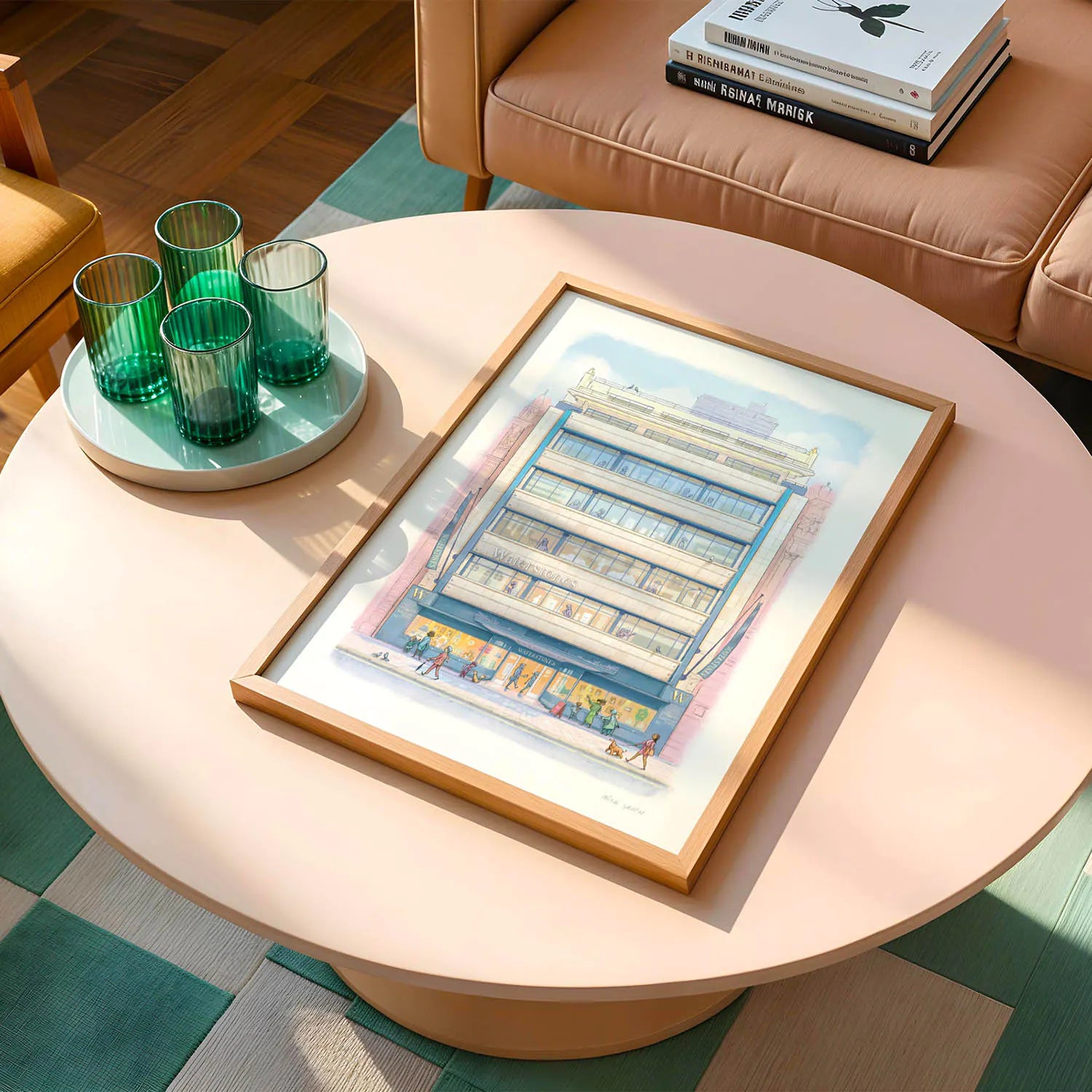 Framed wall art print of Waterstones Piccadilly bookstore on a round coffee table with glasses