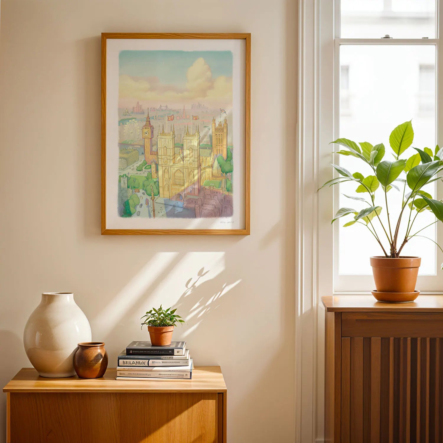 A wall art print of Westminster Abbey in a watercolour illustration style with big ben and the London Eye also shown framed in a room with a window and plants