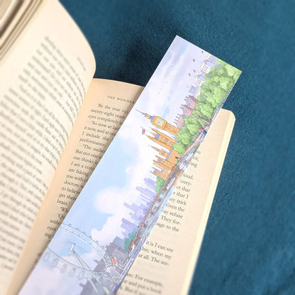 Bookmark with a painting of Big Ben and the London Eye resting on a book